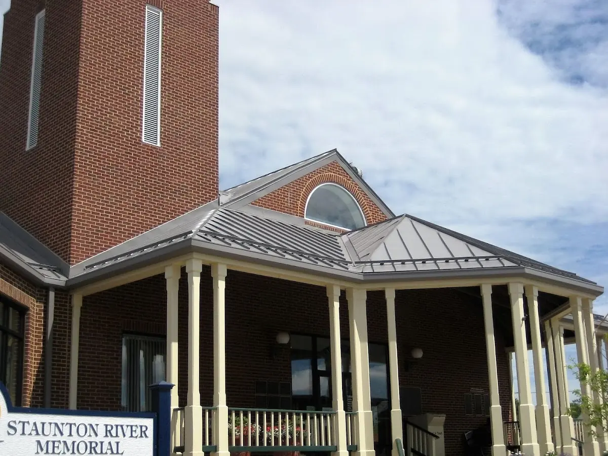 Skilled roofing craftsmen working on a residential roof in Chalmette